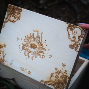 Handmade wooden trinket box etched with all seeing eye, moon phase, celestial design.