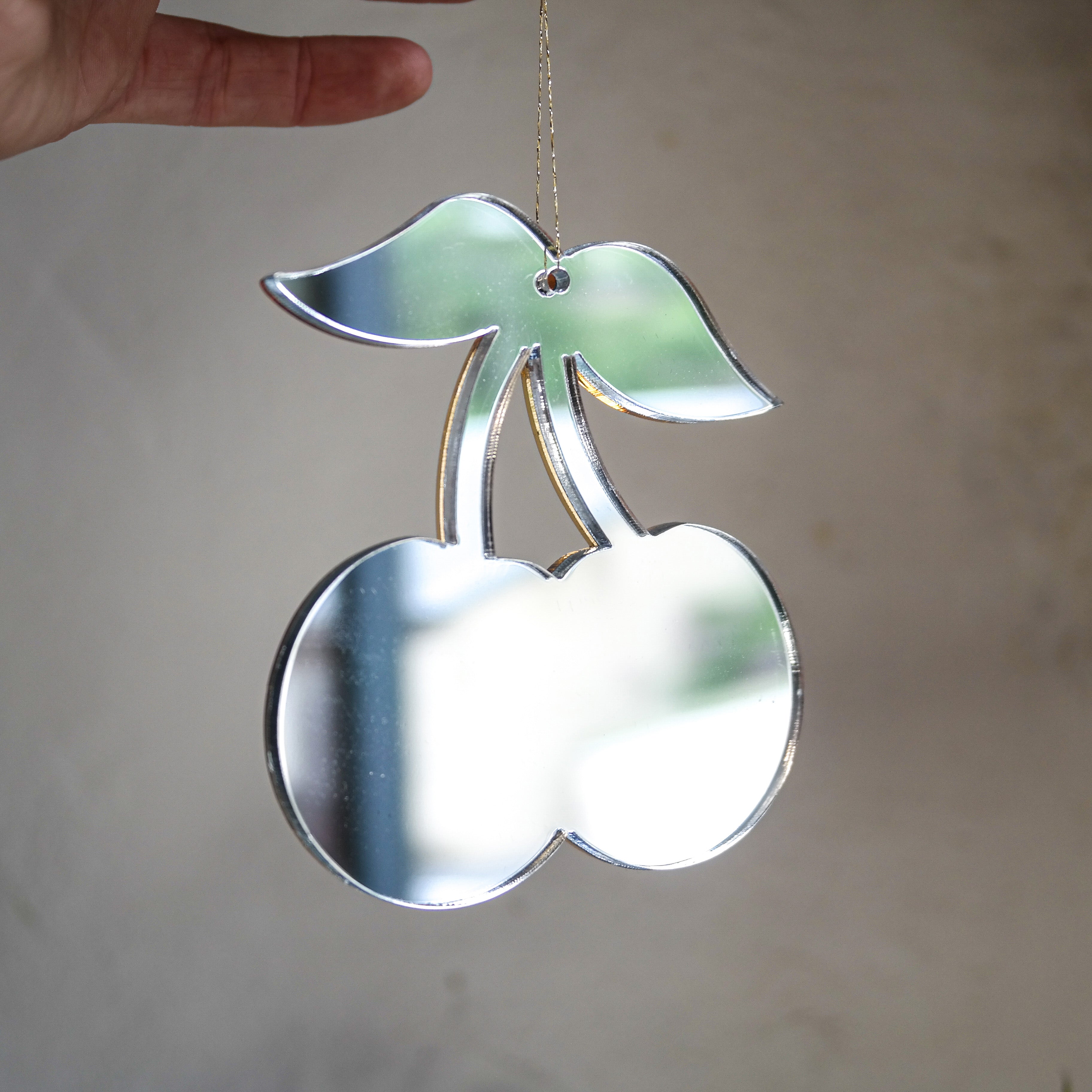 Silver reverse of cherry hanging ornament