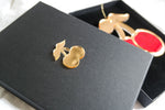 Load image into Gallery viewer, Red &amp; gold cherry ornament in gift box with gold cherry design
