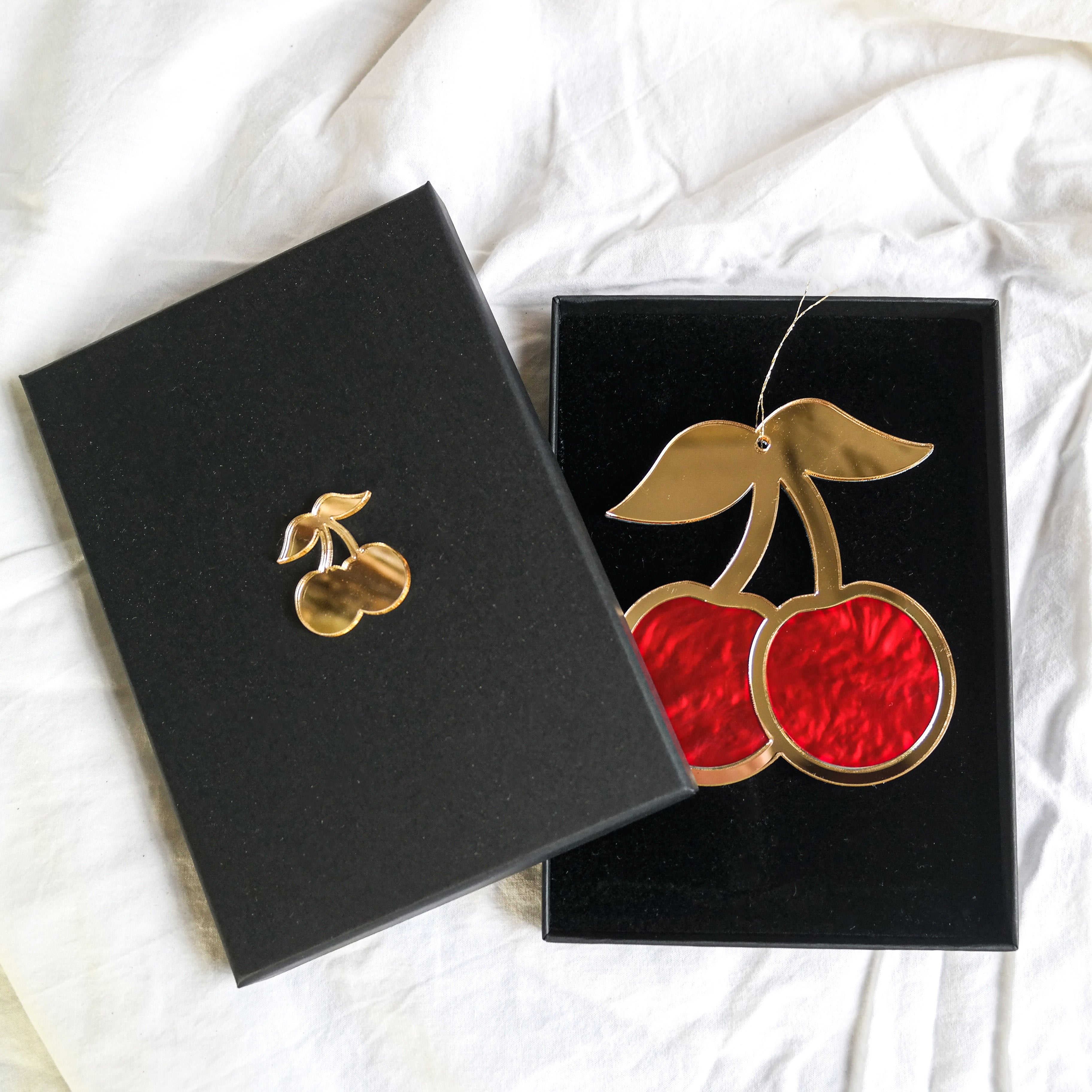 Red & gold cherry ornament in gift box