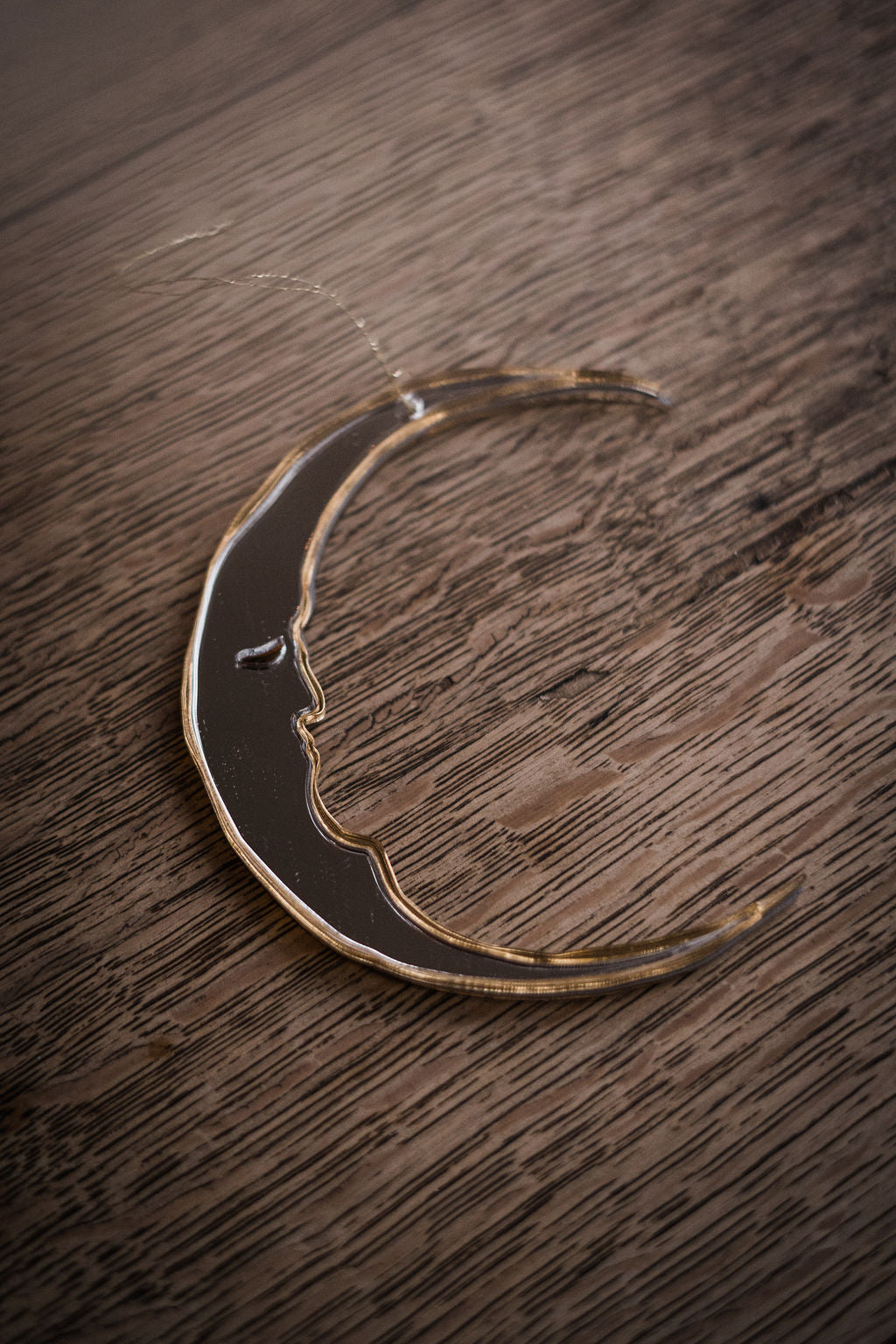 A crescent moon shaped bauble.