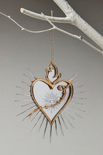 Load image into Gallery viewer, Sacred heart ornament hanging in tree
