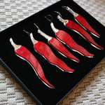 Load image into Gallery viewer, Six chilli pepper shaped ornaments in a gift box.
