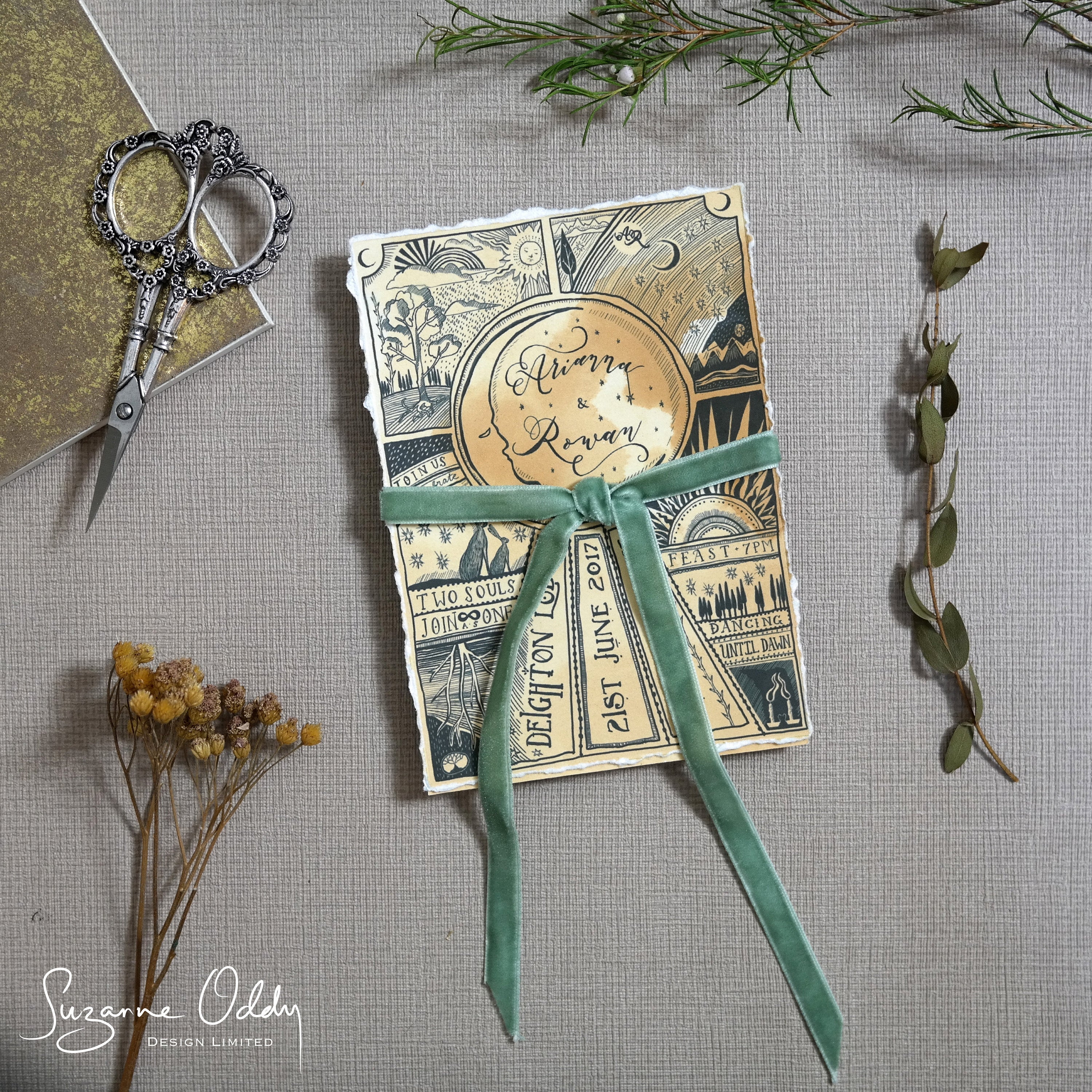 An illustrated wedding invitation with green velvet ribbon & floral surroundings