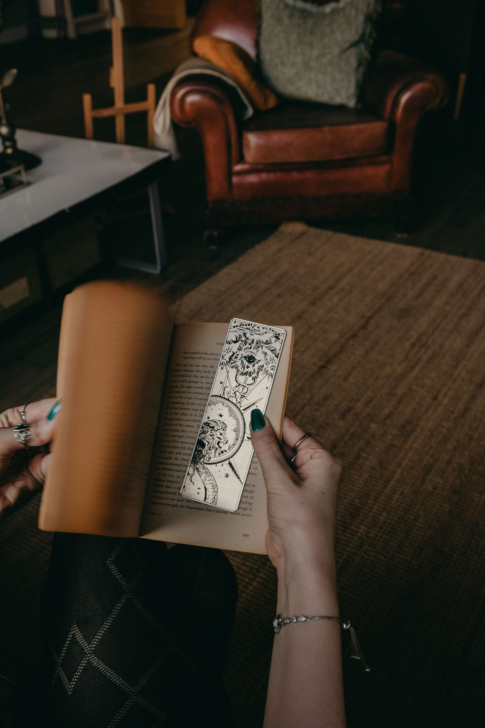 Mystical Eye and Lion Bookmark inside book as pages turn