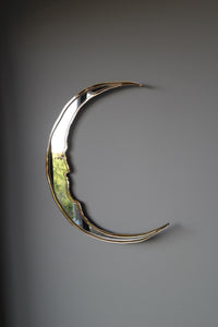 crescent moon shaped mirror