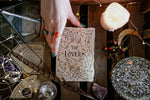 Load image into Gallery viewer, Greeting card with the words &#39;the lovers&#39; next to candles, crystals and feathers

