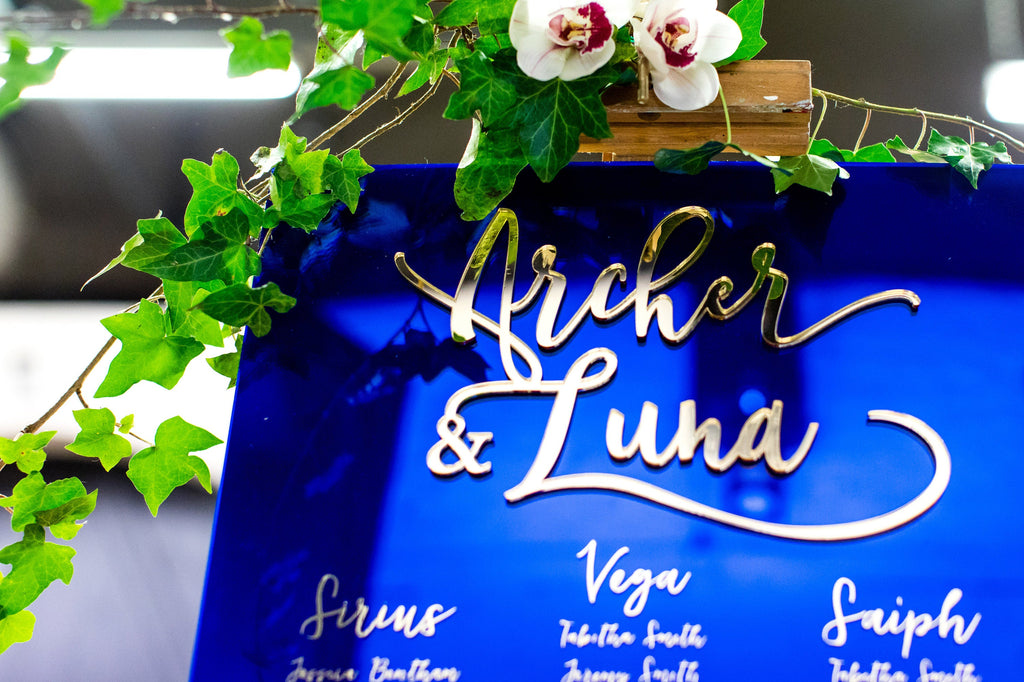 Blue and gold mirrored table seating plan
