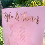 Load image into Gallery viewer, Blush pink seating plan with rose gold names
