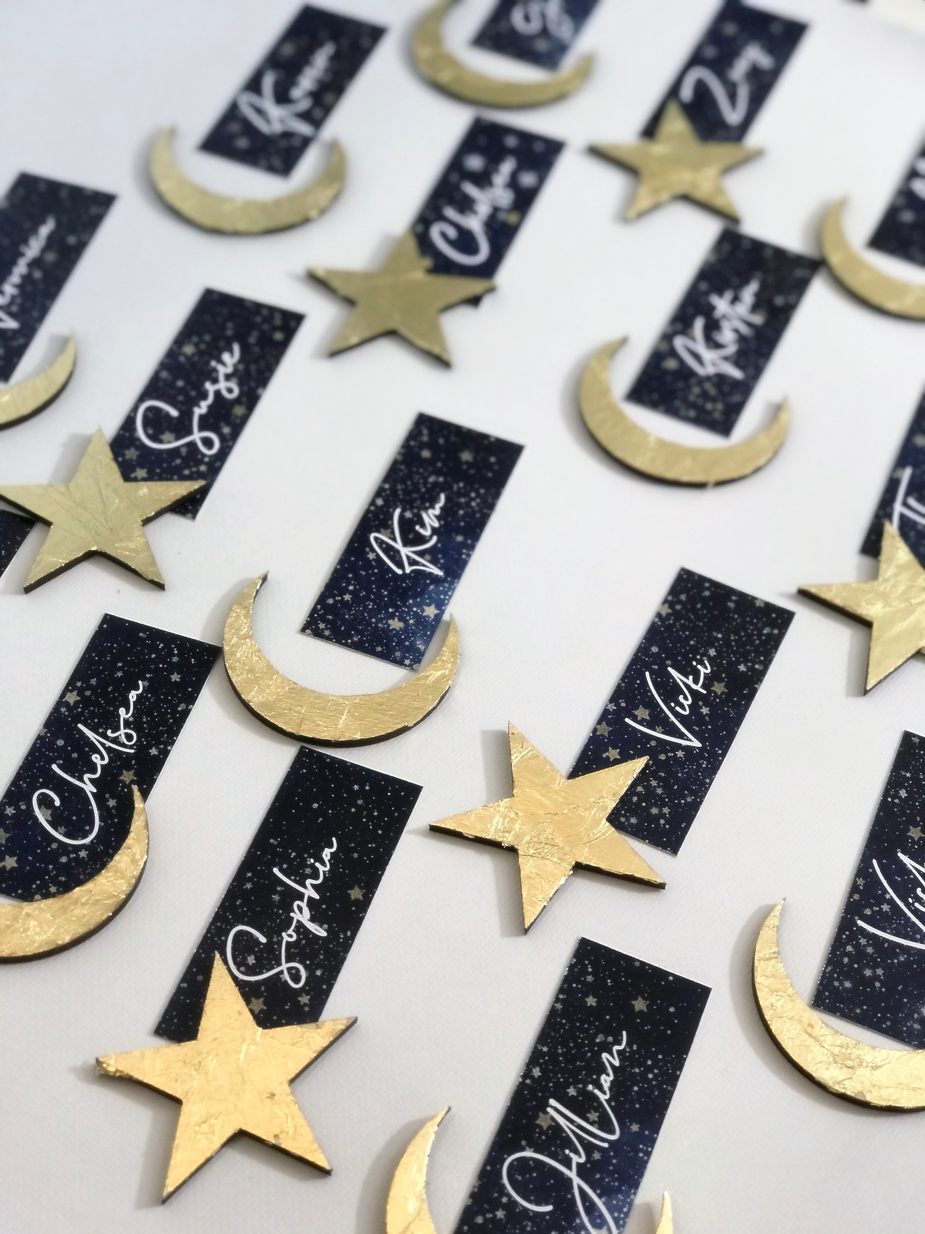 Blue galaxy place name with gold crescent moon or gold star