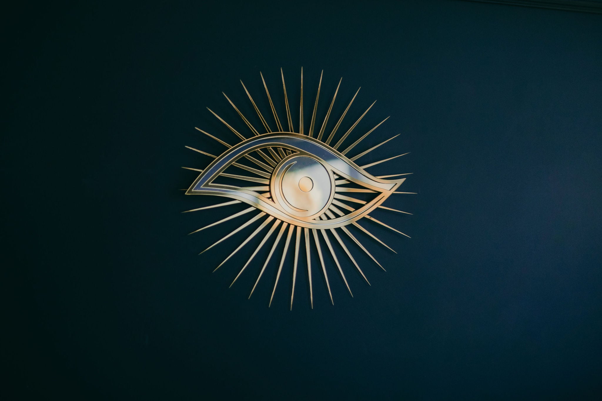 All seeing eye shaped mirror.