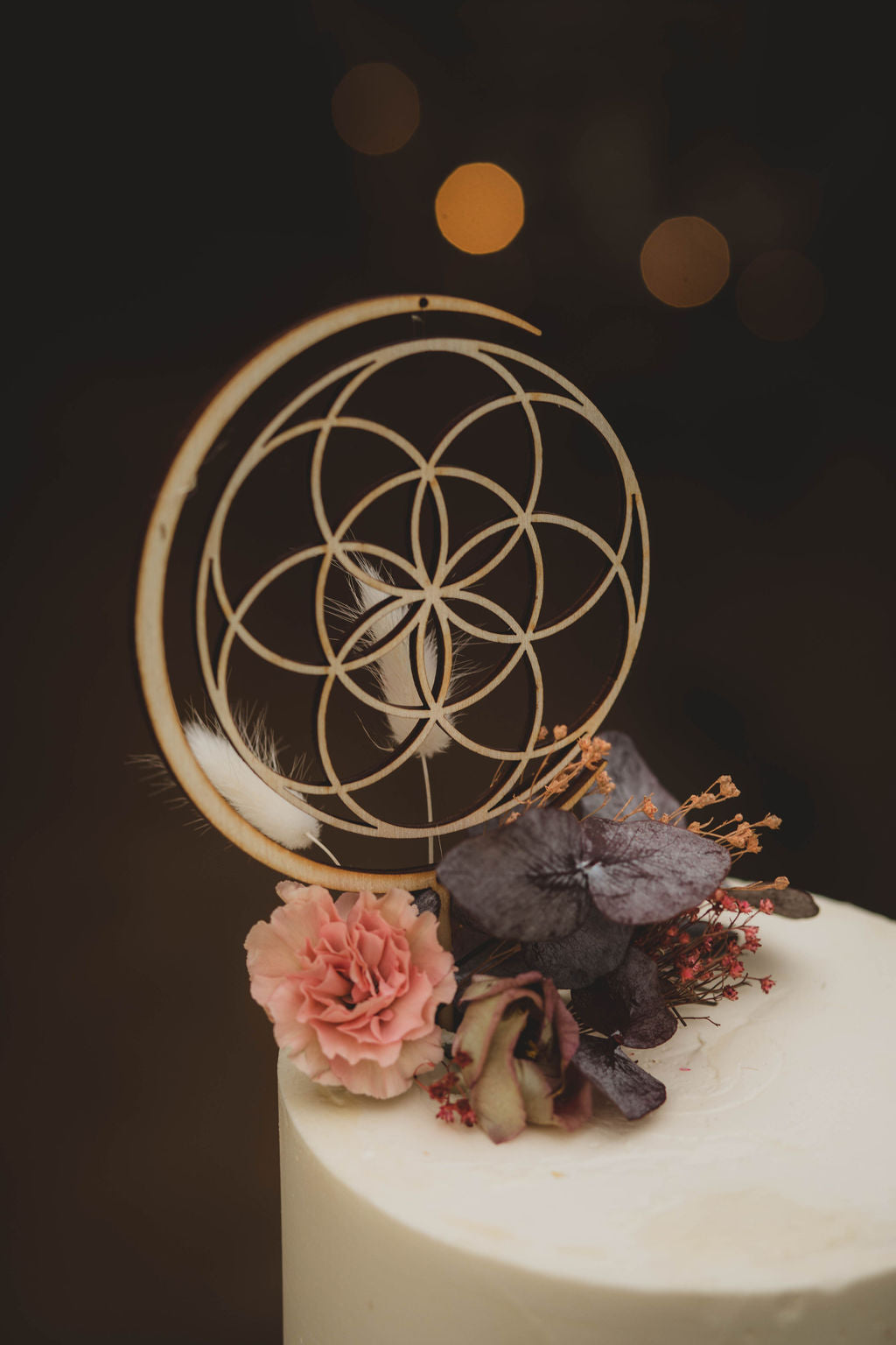 Sacred Geometry wooden cake topper close up