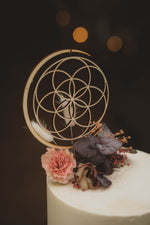 Load image into Gallery viewer, Sacred Geometry wooden cake topper close up
