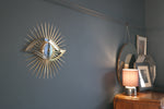 Load image into Gallery viewer, All seeing eye shaped mirror on wall in home.
