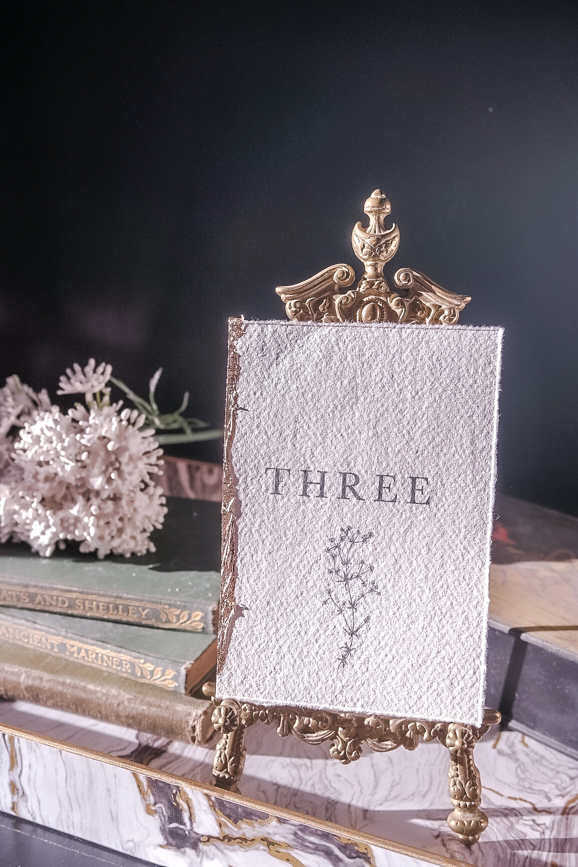  handmade rag paper table number with floral design