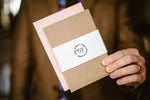 Load image into Gallery viewer, A rustic brown envelope for invitation with floral design
