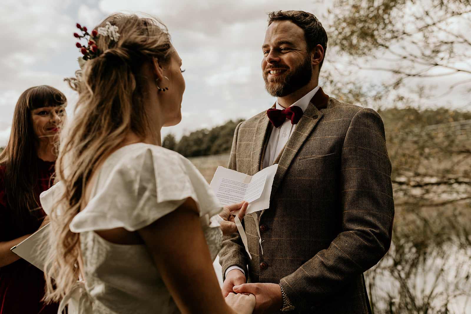 Hers vow book being read to groom