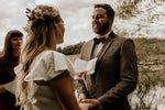 Load image into Gallery viewer, Hers vow book being read to groom
