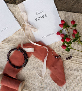 Hers vow book with red accents