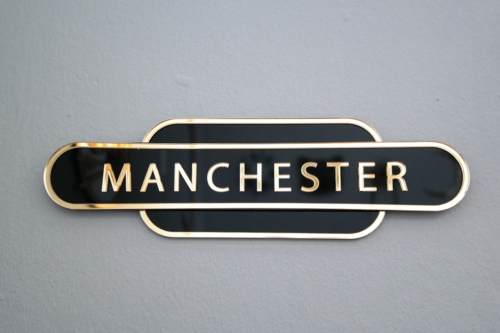 Black & Gold Manchester railway sign for home decoration.