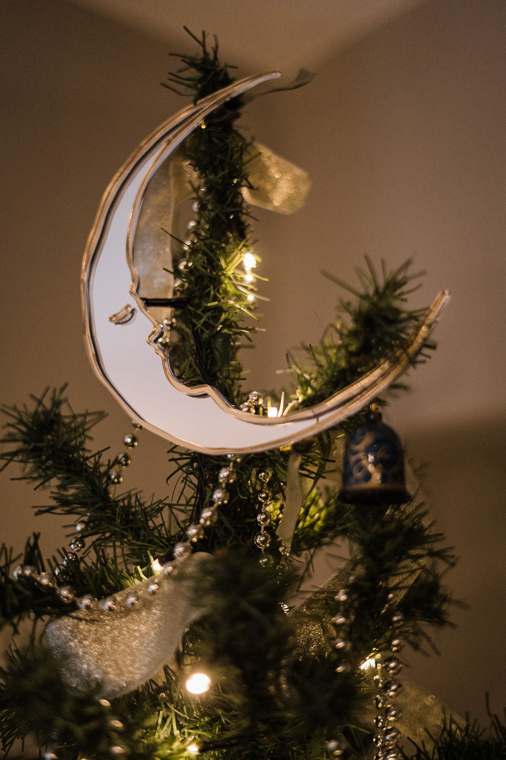 Crescent moon shaped christmas tree topper