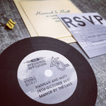 Load image into Gallery viewer, A wedding invitation shaped like a record with personalisation.
