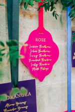 Load image into Gallery viewer, pink acrylic hanging seating plan display for a wedding
