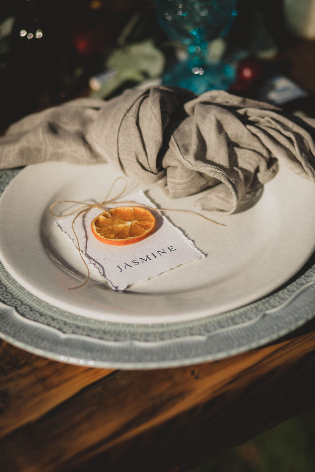 Mediterranean place names on plate with dried orange slice