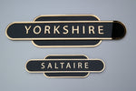 Load image into Gallery viewer, Black &amp; Gold &#39;Yorkshire&#39; &amp; &#39;Saltaire&#39; railway sign for home decoration.
