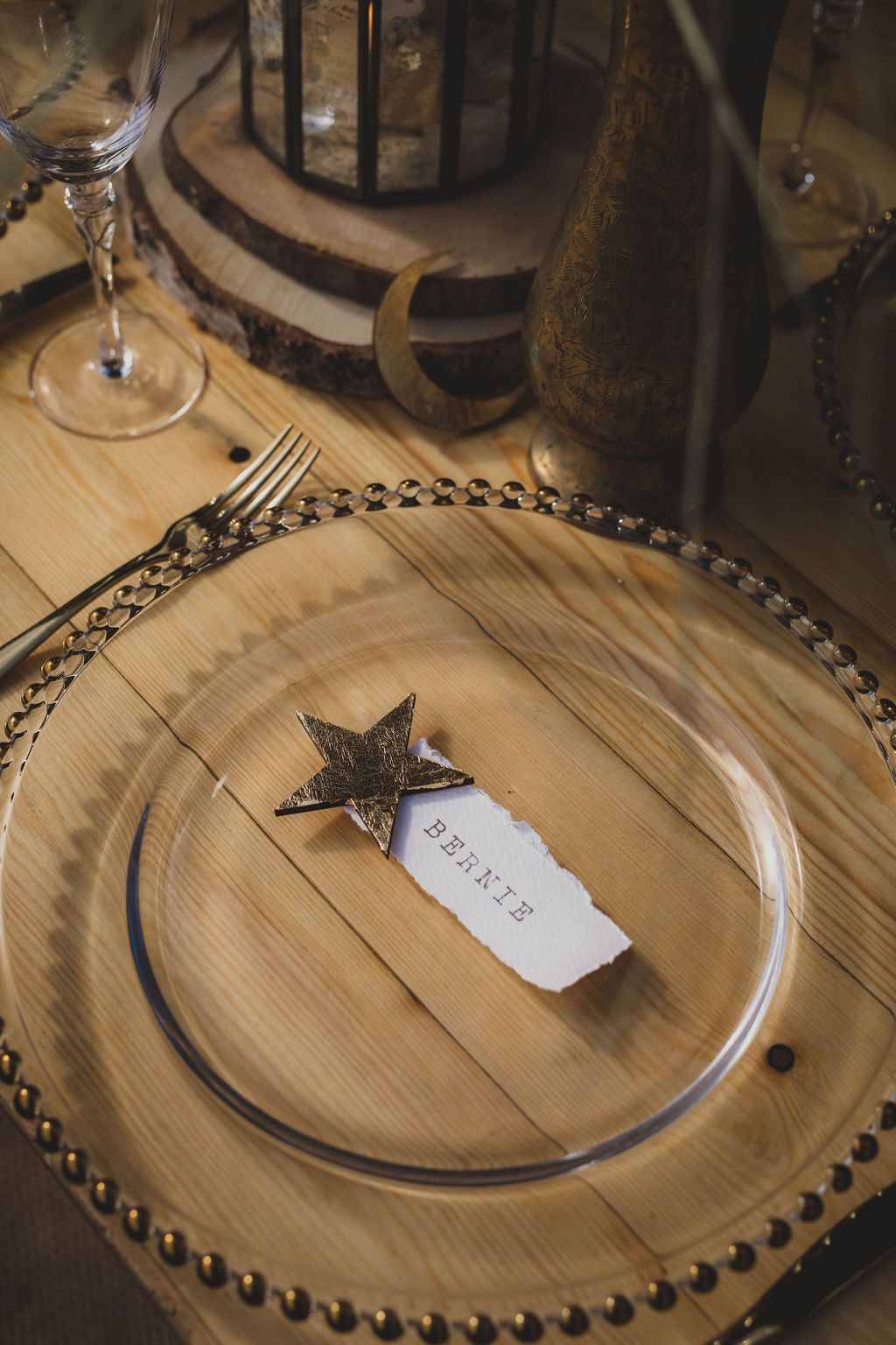 a table place name with gold star accent