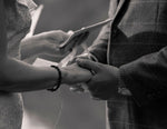 Load image into Gallery viewer, hands holding vow book at elopement ceremony
