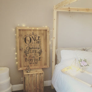 Fairytale Wooden Wedding Sign with fairy lights in honeymoon suite